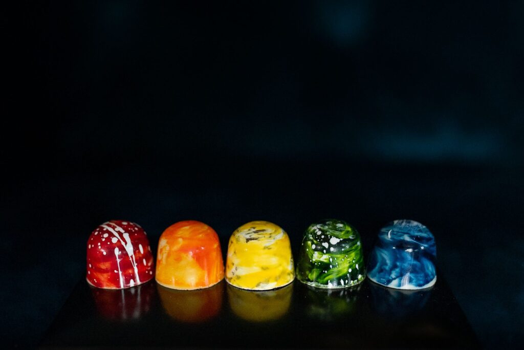 Rainbow selection of colourful chocolates
