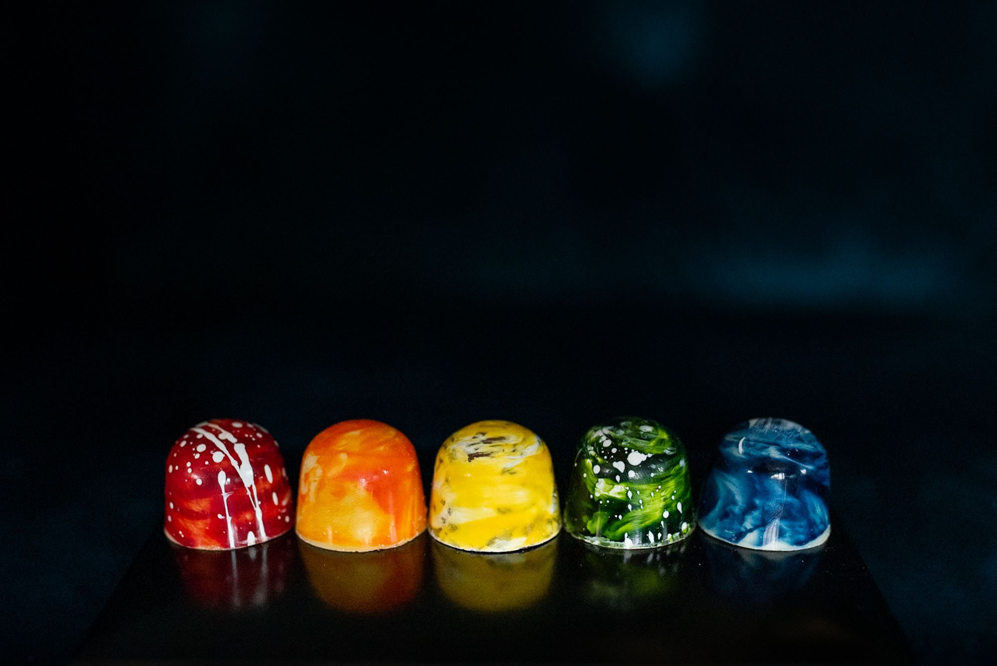 Rainbow selection of colourful chocolates