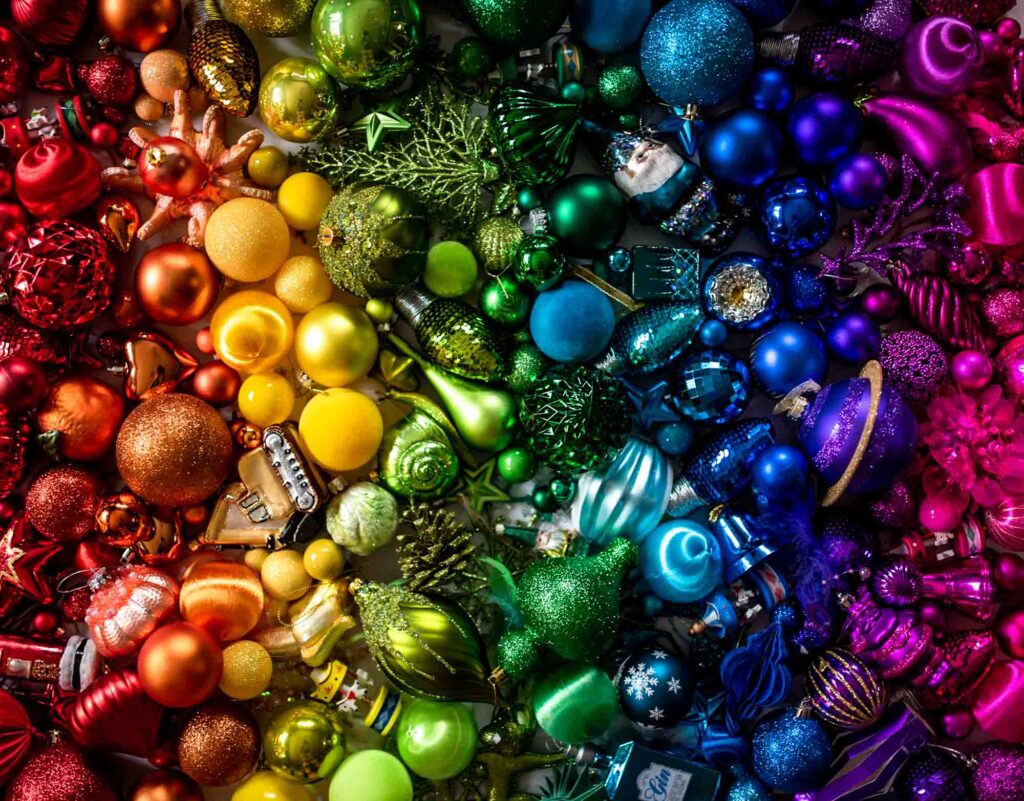A rainbow collection of colourful Christmas baubles