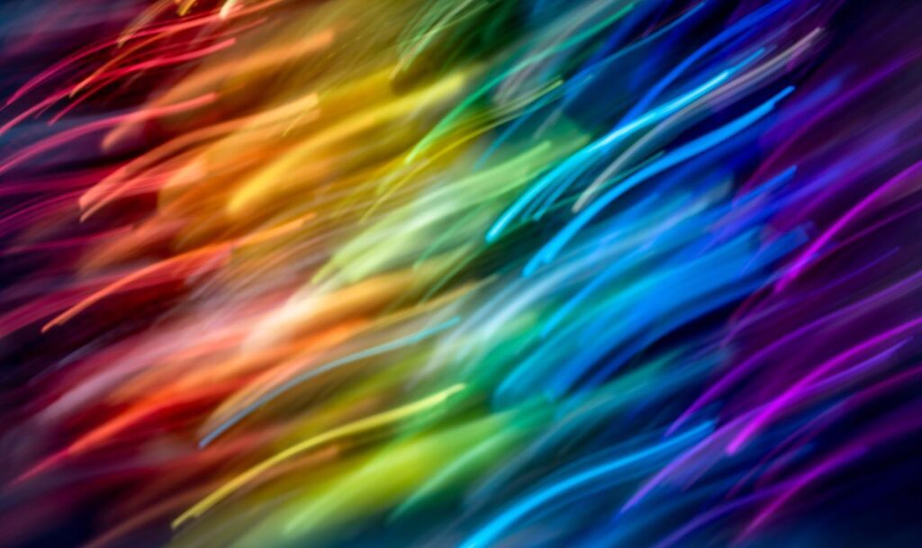 Blurred rainbow light trails