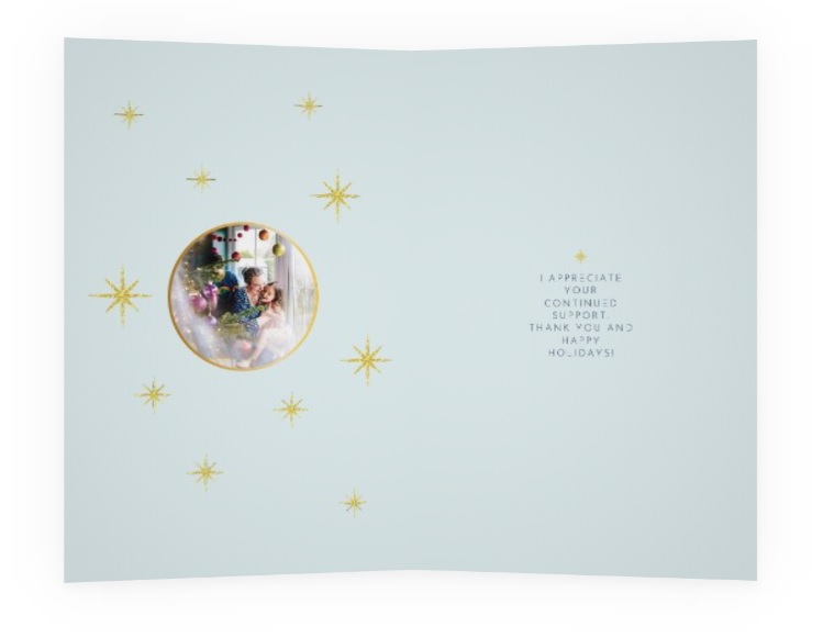 A sample of a Bexphoto Christmas Card design showing Bex's Christmas headshot inside.
