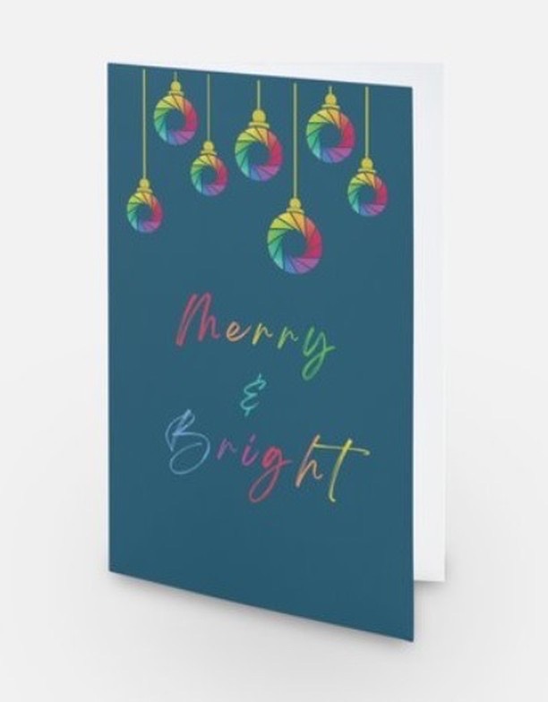 A sample of a Bexphoto Christmas Card design with her rainbow aperture logo as baubles, it says Merry & Bright.